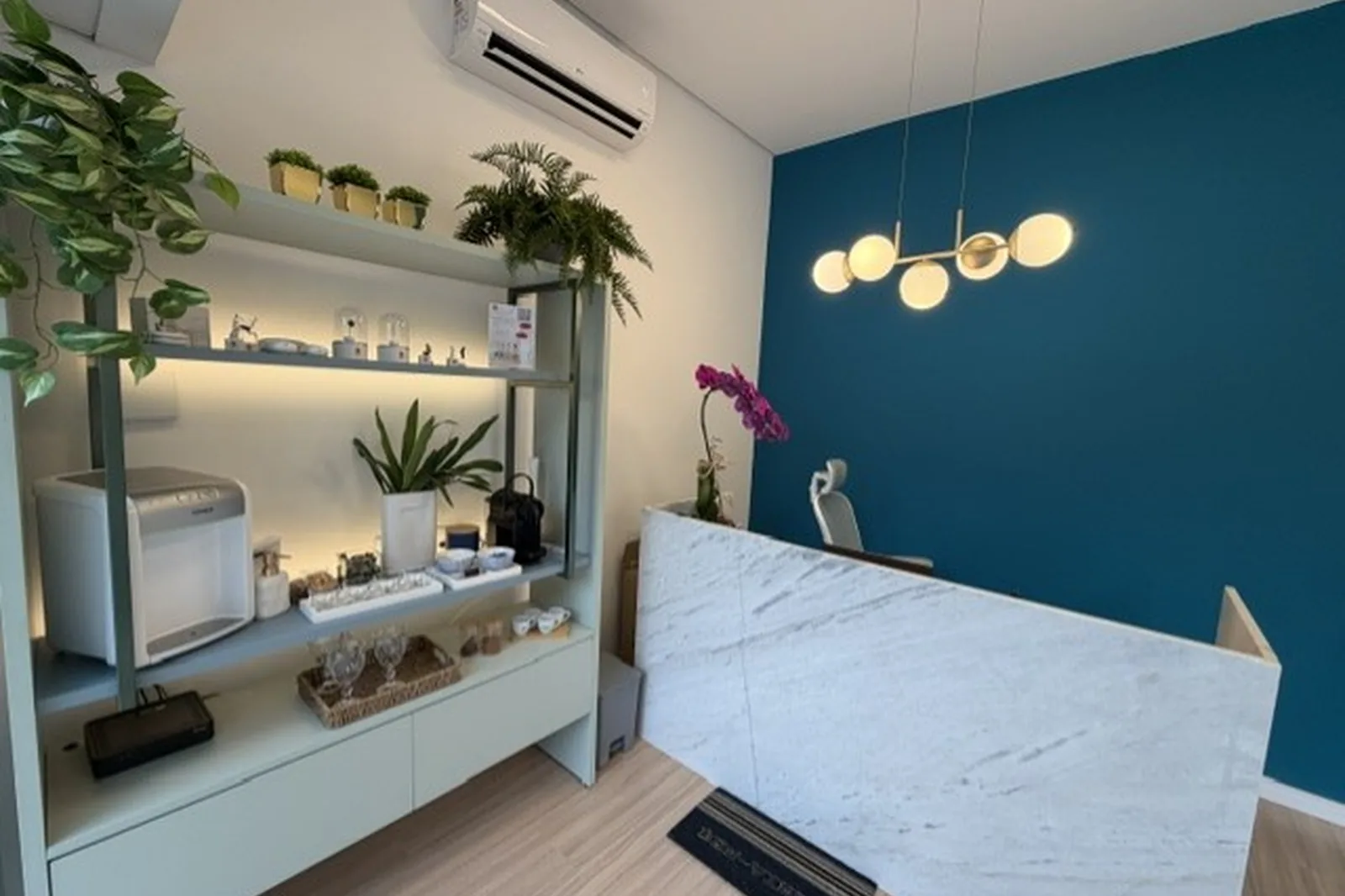 Interior da unidade Acurys de Moema — recepção